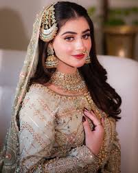 ہاجرا۔✨🌿 Moshaz Bridal Campaign'2025 Signature Mehndi look. A perfectly balanced Mehndi makeup look — glowing skin, sculpted features, and just the right pop of color. Crafted to enhance her natural beauty while